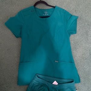 Green infinity scrubs.
